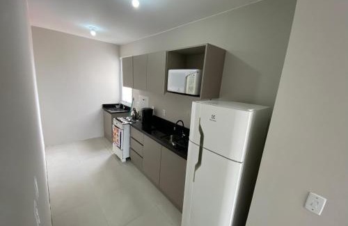 Torres Apartment | Ótimo apto 50m da areia churrasq 2Q 2 banheiros 301