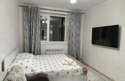Almaty District Apartment | Квартира рядом Новый вокзал Нурлы жол и мечеть Хазрет Султан, быстрый Wi-fi