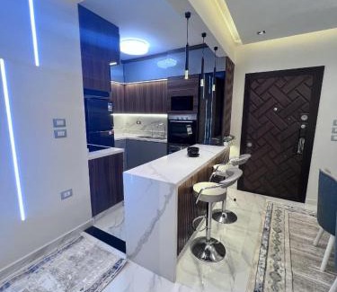 Nasr City Apartment | ستوديو فندقي للايجار في كومباوند وان قطامية علي دائري المعادي