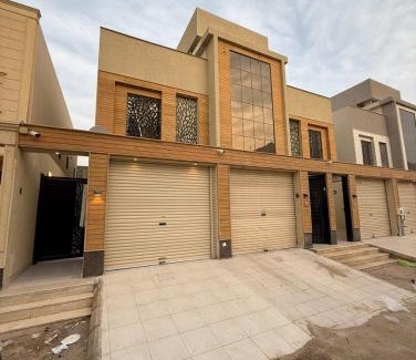 Mizail Apartment | غرفه صاله بتصميم مودرن مدخل سياره