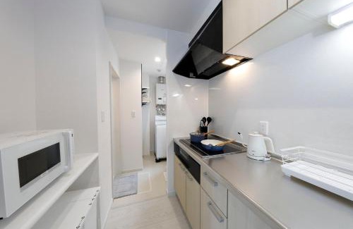 Toyohira Apartment | わっず福住