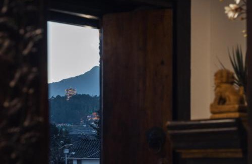 Gucheng Hotel | 丽江见山庐观景花园民宿