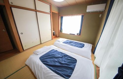 Furusato Cho Apartment | 桜島の廃校を使った和室ゲストハウスulalaふるさと