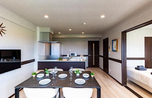 Yonabaru Apartment | 海の見える高層階グループファミリー歓迎コストコ近くThe琉球タワー9A