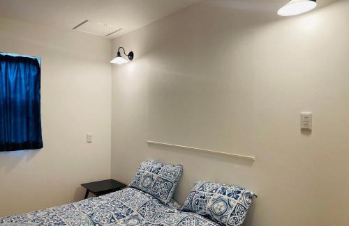 Okinawa Ski Chalet | 空港まで車で15分ビーチまで徒歩1分海沿いの閒雲斎