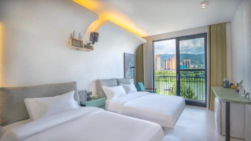 Jinghong Hotel | 西双版纳回见江景酒店