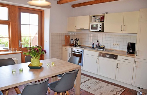 Alt Reddevitz Apartment | 01 Holiday apartment with lake view - Holiday apartments on the Reddevitzer Hövt