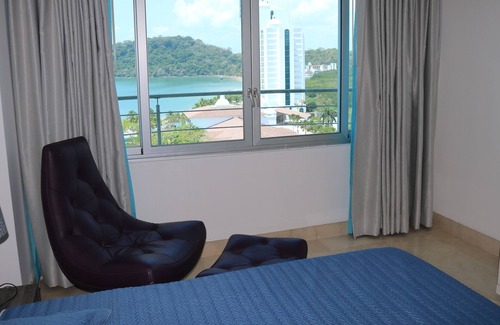 Playa Bonita Village Apartment | 08A Stunning Rooftop Pool, Views of Canal/Ocean