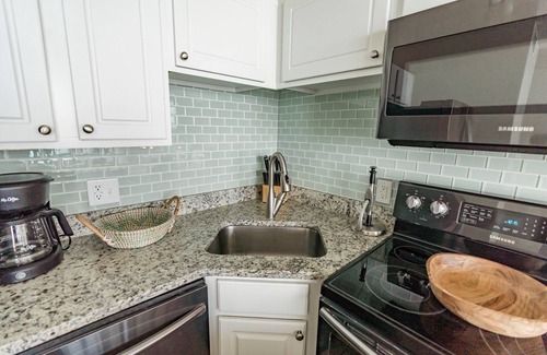 Wilmington Beach Condo | 0912 White Linen Room by Atlantic Towers