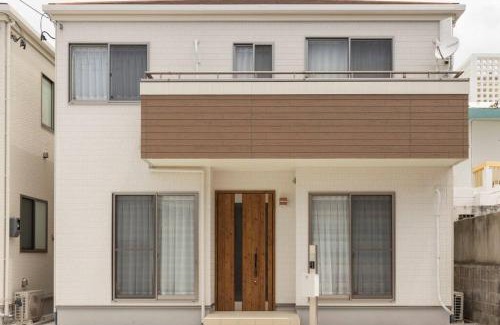 Chatan Villa | 1棟家貸し切り!潮騒の中で異国情緒溢れるリゾート地「北谷」を満喫:)