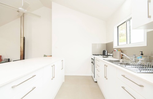 Norfolk Island Ski Chalet | 1 bedroom 1 bath house w patio incl car