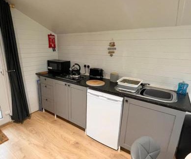 Corwen House | 1 Bedroom Log Cabin in Parc Pen y Bryn Sleep 2 3