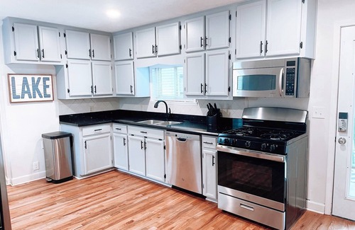 Buford House | 1 mile from Lanier Islands with Deep Water Dock & Year Round Beautiful Views!