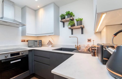 Cheltenham House | 1 Northall · One Bedroom Detached Home with Gated Parking