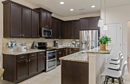 Sun Bay South Villa | #1 Rated Mansion · Heated Saltwater Pool/Spa, Theater, Peloton Gym, Game Room