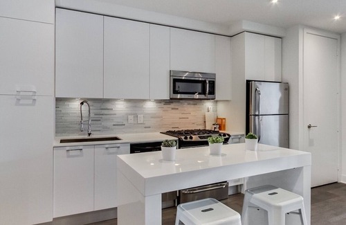 Wellington Place Condo | 100% Walk Score! NEW Large, High Ceilings, Designer Luxury Open Style Live/Work!