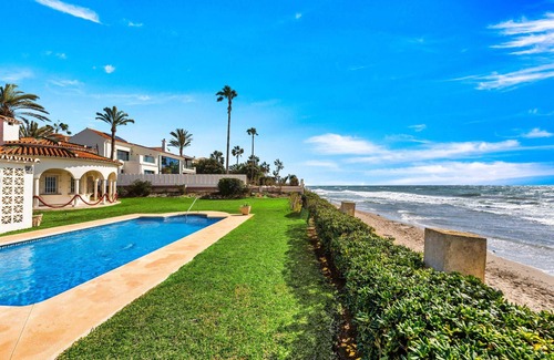 Urbanizacion Marbessa Villa | 1100 Stunning Marbesa Beachfront Villa with Garden Pool