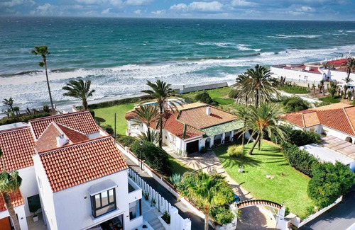 Urbanizacion Marbessa Villa | 1100 Stunning Marbesa Beachfront Villa with Garden Pool