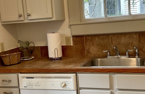 Uptown Historic District Cottage | 120 year old carriage house in uptown residential neighborhood