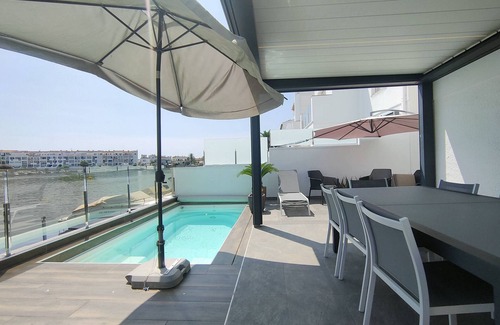 Castello d'Empuries Ski Chalet | 138-Empuriabrava lovely house overlooking the lake, with pool.