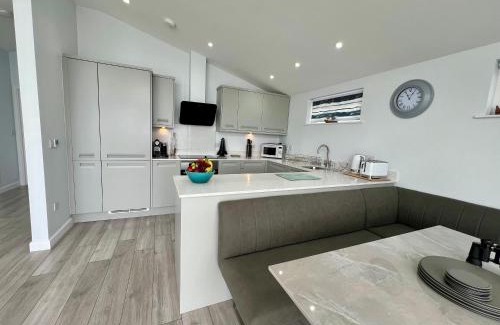 Westleigh House | 15 Golden Bay Holiday Village - Coastal Retreat with Breathtaking Views