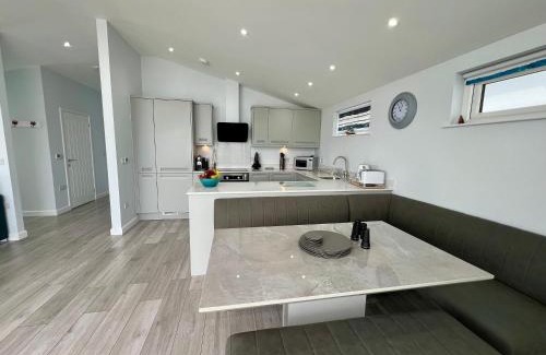 Westleigh House | 15 Golden Bay Holiday Village - Coastal Retreat with Breathtaking Views