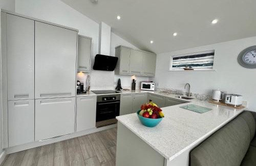 Westleigh House | 15 Golden Bay Holiday Village - Coastal Retreat with Breathtaking Views
