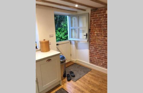 Glastonbury House | 16 Century Farmhouse Cottage, foothills of iconic Glastonbury Tor.