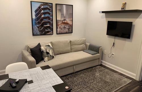Industry Apartment | 1631 1D · Astounding Apt/20 min to NYC-Parking Avail. Steps away from bus stop.
