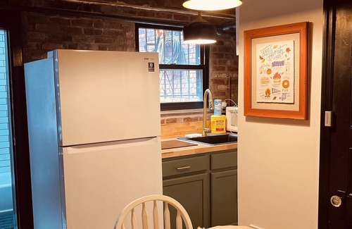 Historic Downtown House | 1850s historic Row House 7min train to NYC with private backyard