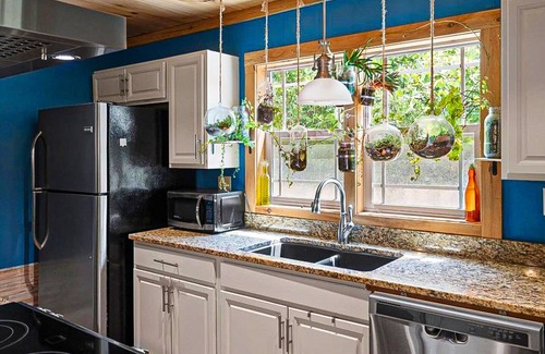 Chimney Rock House | 1920s artsy cottage with Chimney Rock views, yard, sauna, & firepit - dogs ok