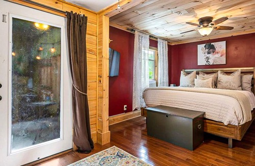 Chimney Rock House | 1920s artsy cottage with Chimney Rock views, yard, sauna, & firepit - dogs ok