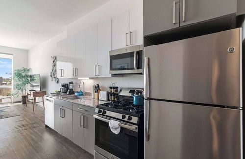 Palmer Square Apartment | 1BR City Loft With Modern Glass Views