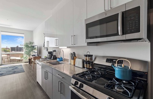 Palmer Square Apartment | 1BR City Loft With Modern Glass Views