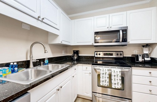Vaught Condo | 1st floor condo with pool, tennis, close to beach & golf