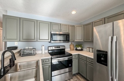 Sioux Falls Condo | 1st Floor Condo, Zero Threshold Door, Garage, Patio