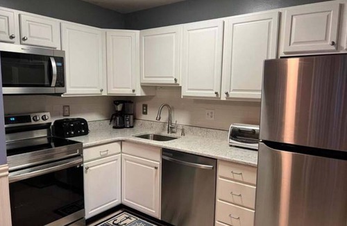 Caine Woods Condo | 1st floor North OC 2br, 2 ba condo w/pool, tennis, wifi and plenty of parking
