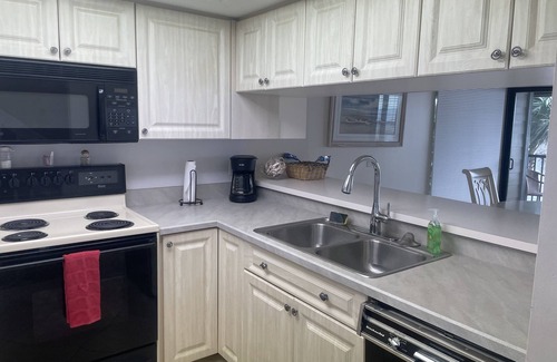 Bokeelia Condo | 2/2.5 condo with docking available for your boat and pools for soaking
