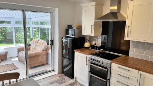 Pentraeth House | 2 Bed House - Sleeps 4 - Pets - Garden - Parking