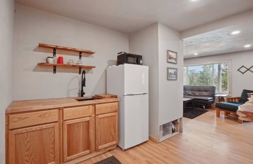 Sturgis Cabin | 2-bedroom, 1 bathroom log cabin Bottom floor offers the perfect retreat close to downtown Sturgis. With breathtaking views and a peaceful wooded setting, this cozy home-away-from-home. Comfortably accommodating up to 6 guests.