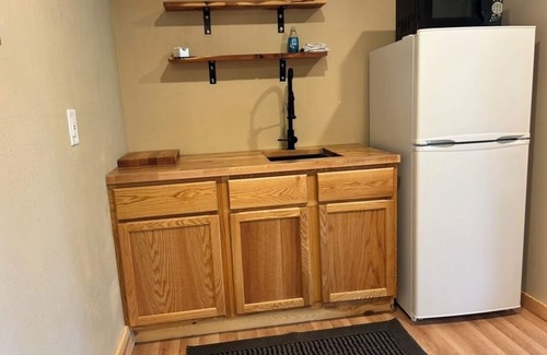 Sturgis Cabin | 2-bedroom, 1 bathroom log cabin Bottom floor offers the perfect retreat close to downtown Sturgis. With breathtaking views and a peaceful wooded setting, this cozy home-away-from-home. Comfortably accommodating up to 6 guests.