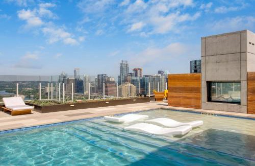 Rainey Street Historic District House | 2 Condos in New Austin High Rise Luxe Amenities Rooftop Pool GymYoga Studio