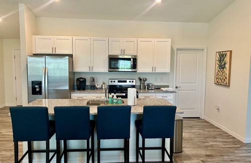 Diplomat House | 2 New, Stunning homes with Heated Saltwater Pools and Piers!