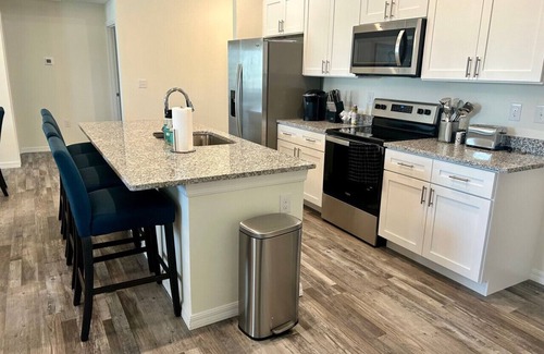 Diplomat House | 2 New, Stunning homes with Heated Saltwater Pools and Piers!