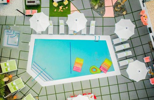 Tahquitz River Estates House | 2 Rooms Sleeps 8 Retro Hotel w Pool Wesley King Studio Buyout by AvantStay