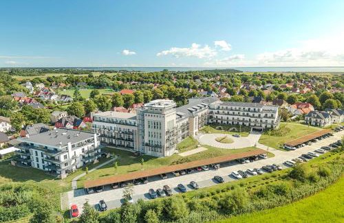Ostseebad Wustrow Apartment | 2-Zimmer Ferienwohnung zwischen Ostsee und Bodden mit Süd- und Westbalkon