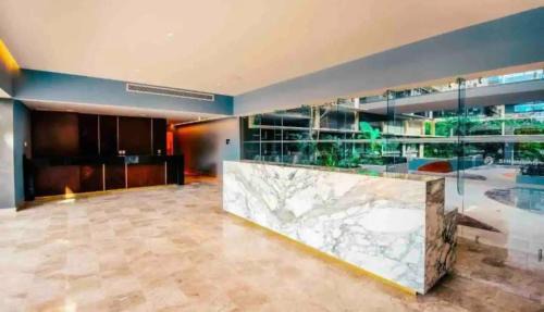 Zazil-ha Apartment | 2022 Modern Condo Steps to the Ocean w/Hot Tub