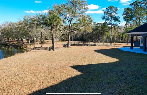 Ravenel House | 26 acre gated private property close to Downtown Charleston on a lake