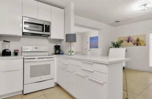 Northeast Coconut Grove House | 2710 · Heated Pool 7 Beds 5 Baths Sleep 15 Park 4 Car