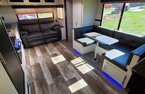 Eustis House | 27ft Nightly Rental RV in Sylvester Farm Campground and Cabins.